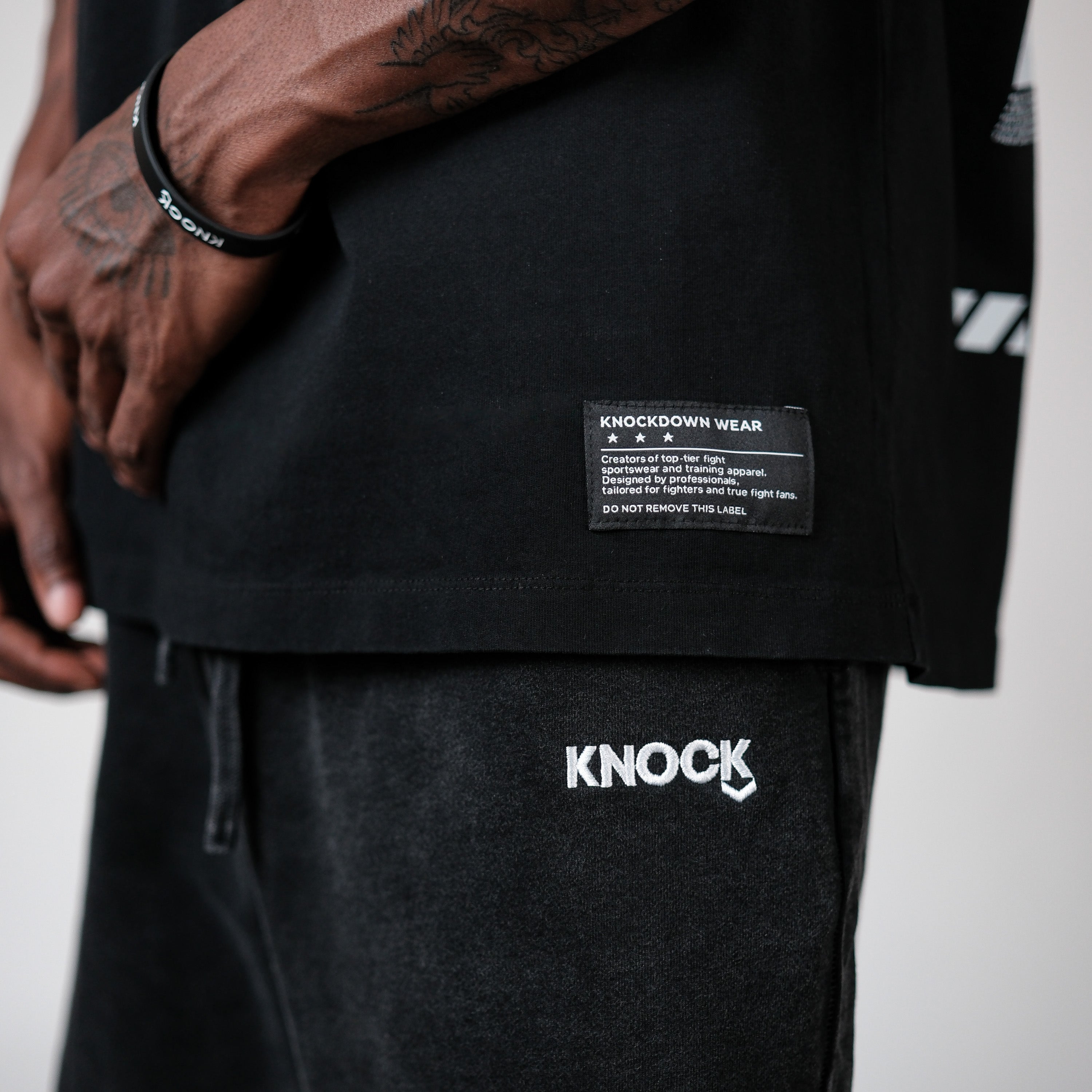 EMBRACE THE STRUGGLE SLEEVELESS TEE