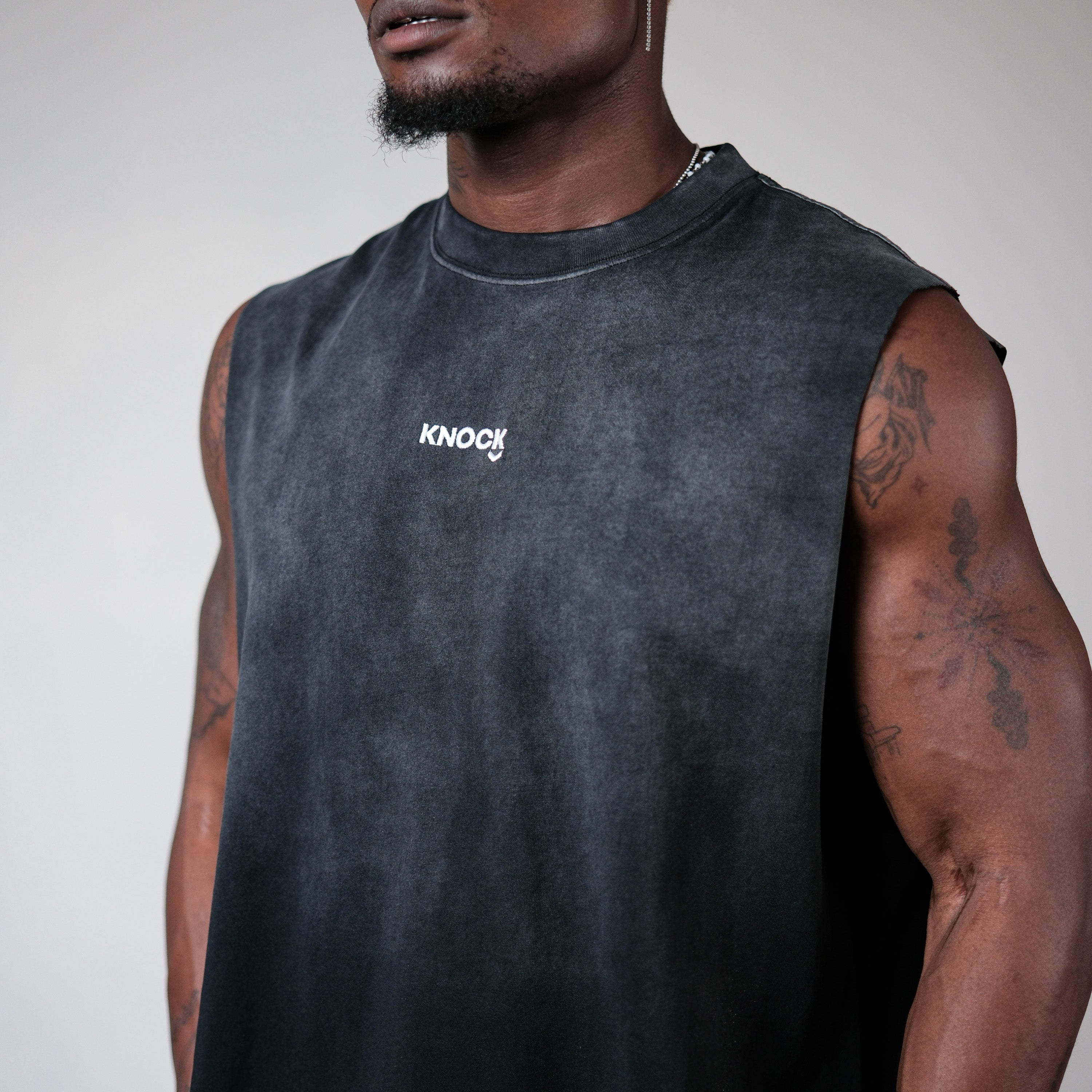 EMBRACE THE STRUGGLE SLEEVELESS TEE