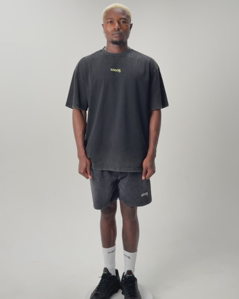 Load video: ASTROKNEE 2.0 TEE VINTAGE BLACK