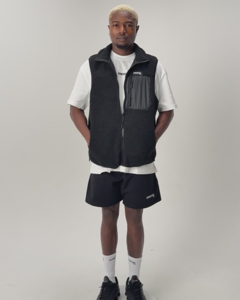 Load video: COZY FLEECE VEST